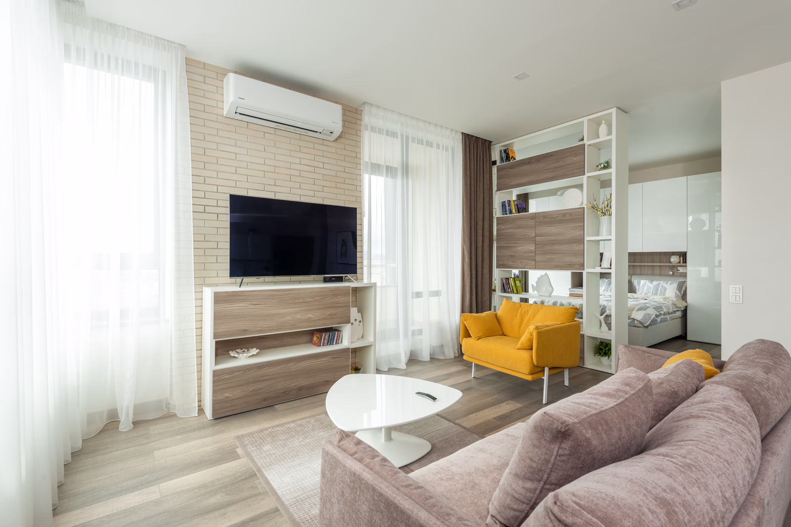 Studio apartment interior with the living and sleeping areas combined